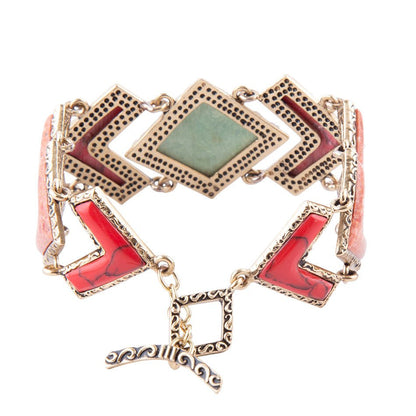 Bracciale a catena dorata con arazzo di turchese verde e corallo