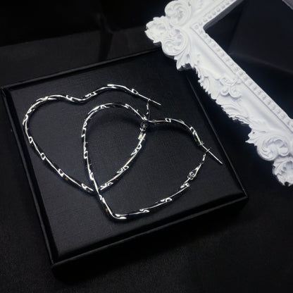 Kolczyki koła Twisted Heart