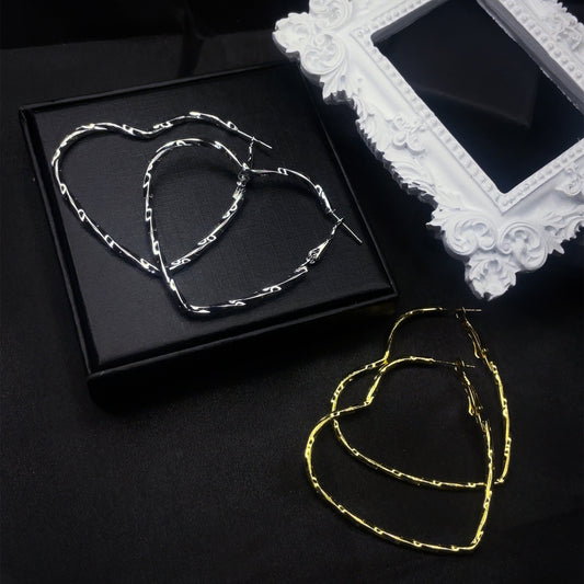 Kolczyki koła Twisted Heart