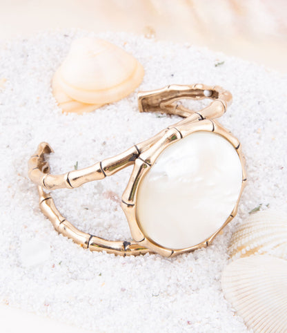Bracciale a polsino in madreperla bianca e bambù dorato
